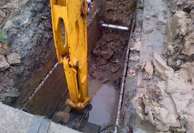 Excavating earthe grave wet graves 5
